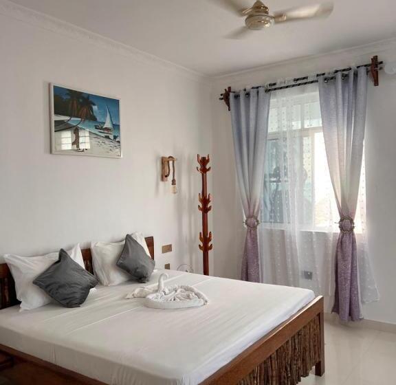 اتاق لوکس با تخت بزرگ, Nungwi Beach Front