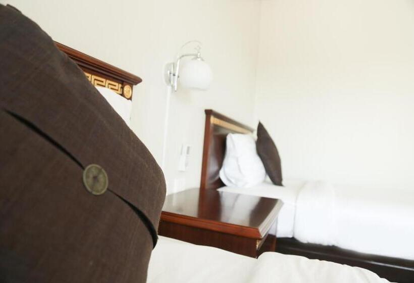 غرفة ديلوكس, De Karon