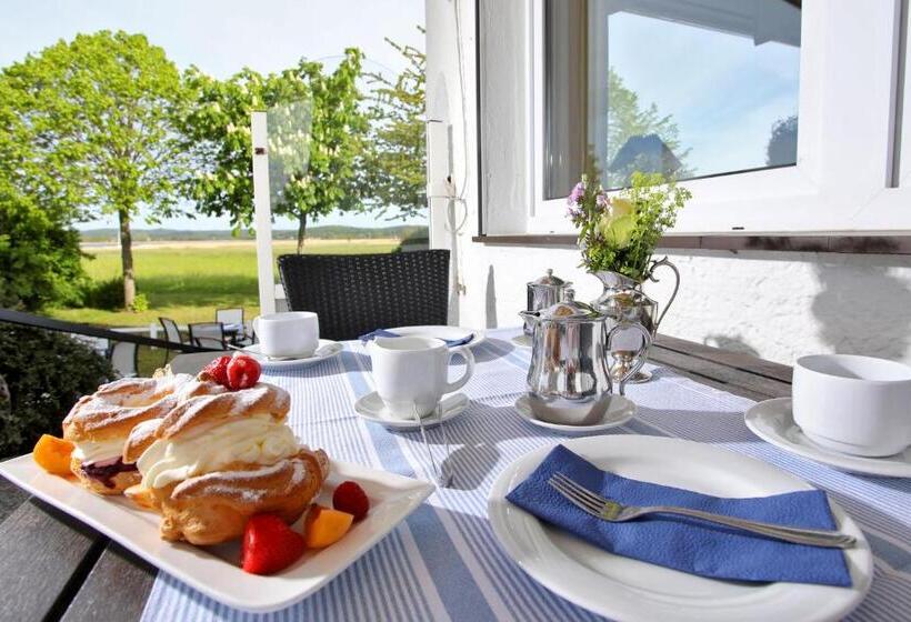Comfort room with terrace, Am See