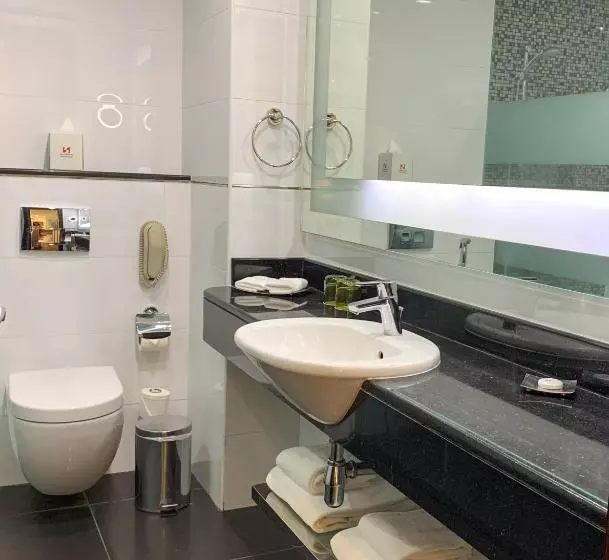 キングサイズベッドのデラックスルーム, Swiss Belhotel Seef Bahrain