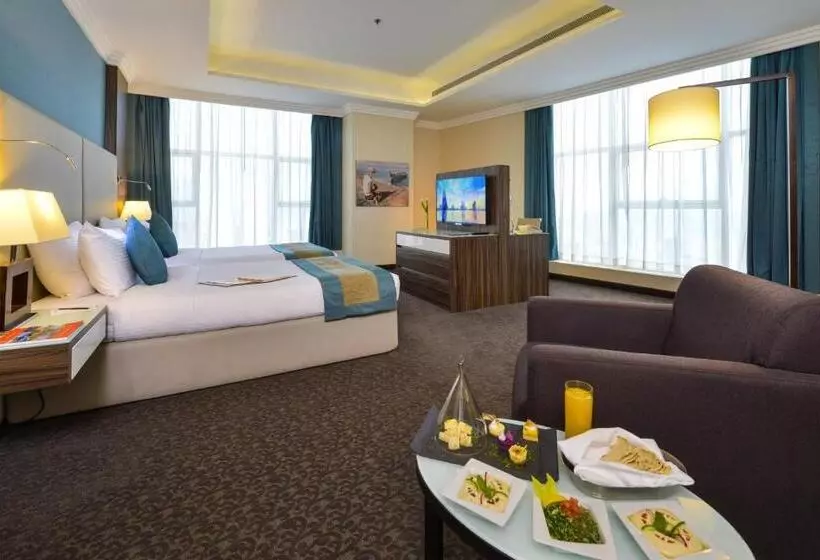 キングサイズベッドのデラックスルーム, Swiss Belhotel Seef Bahrain