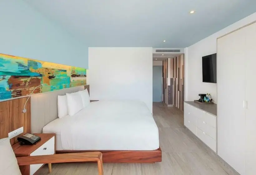 キングサイズベッドのデラックスルーム, Courtyard By Marriott Mazatlan Beach Resort