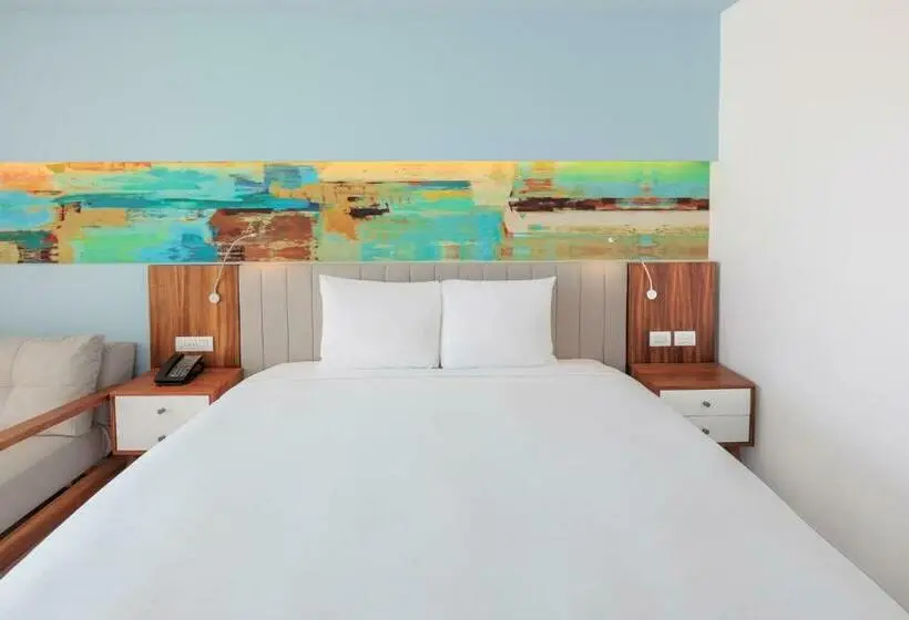 キングサイズベッドのデラックスルーム, Courtyard By Marriott Mazatlan Beach Resort