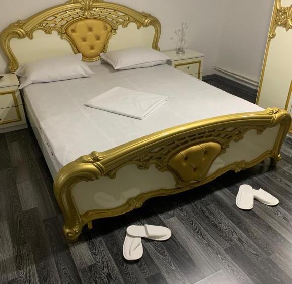 デラックスの４人部屋, Vila  Melissa Cazare