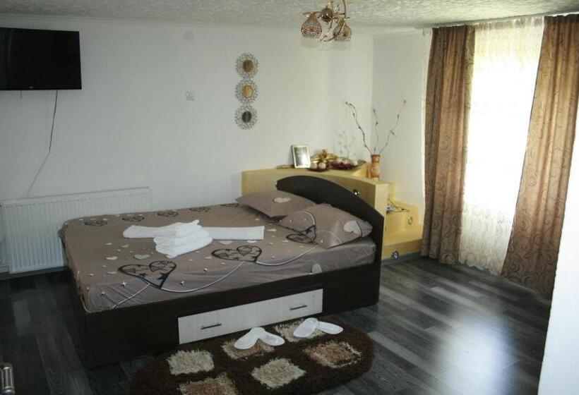 デラックスの４人部屋, Vila  Melissa Cazare