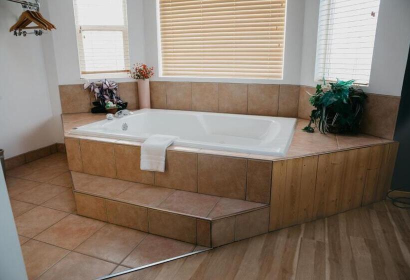 סוויטה אקזקיוטיב, Golden Village Lodge