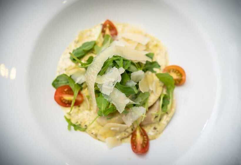 חדר דלוקס, Caravelli