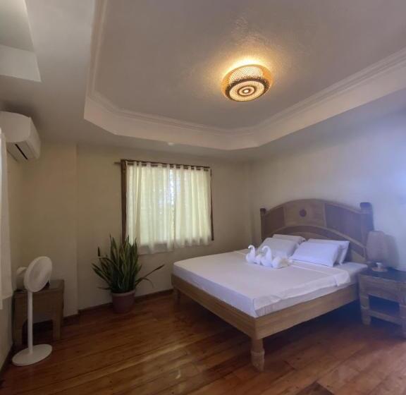 מיטת קינג בסוויטה, Tahanan Resort