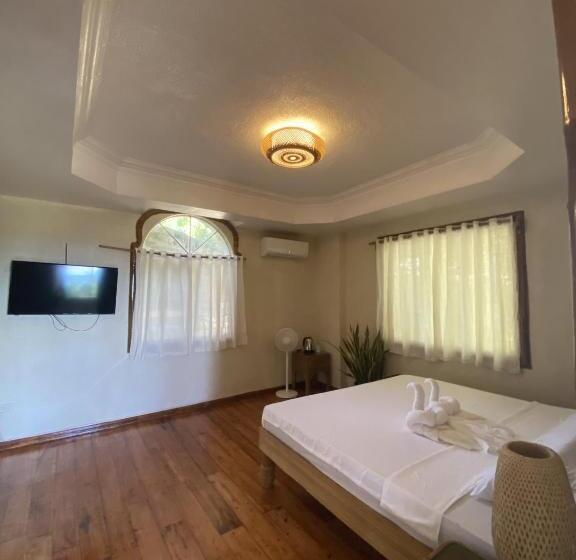 מיטת קינג בסוויטה, Tahanan Resort