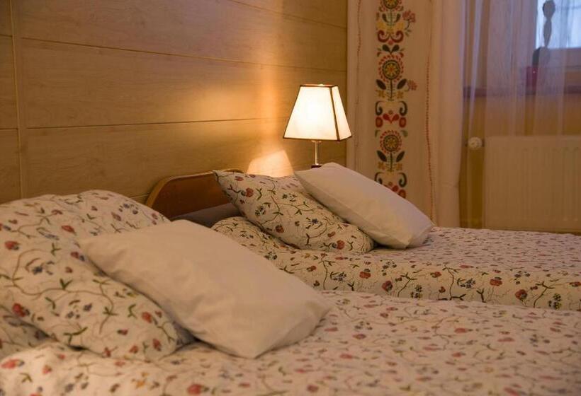 Номер Стандарт, Kamienica