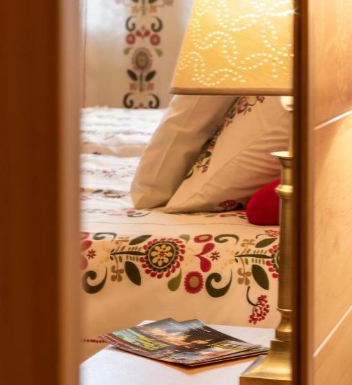 Номер Стандарт, Kamienica