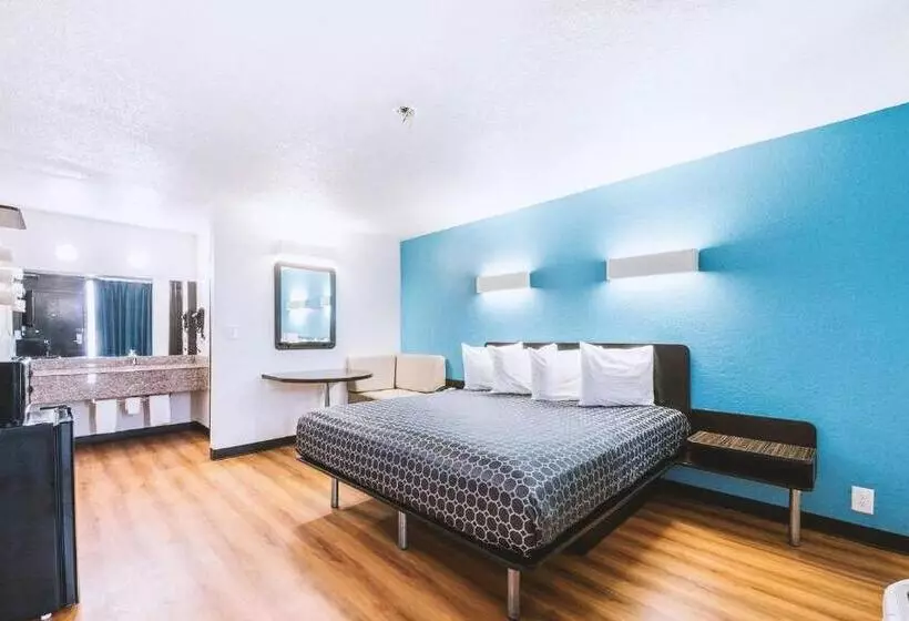 キングサイズベッドのスタンダードルーム, Sky Palace Inn & Suites By Jasper Beeville