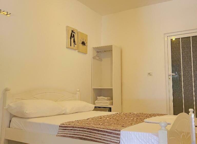 اتاق استاندارد چهارنفره با چشم‌انداز باغ, Garden Villa Naza