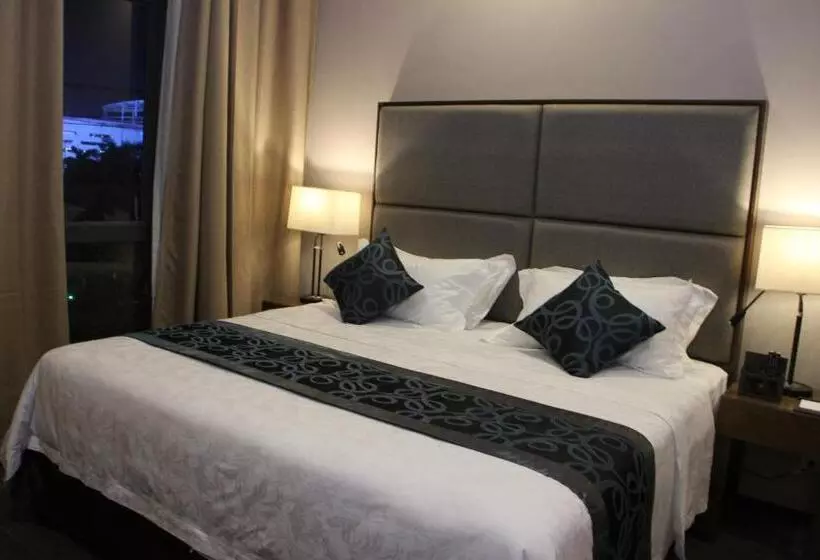 キングサイズベッドのデラックスルーム, Golden Phoenix Hotel   Manila
