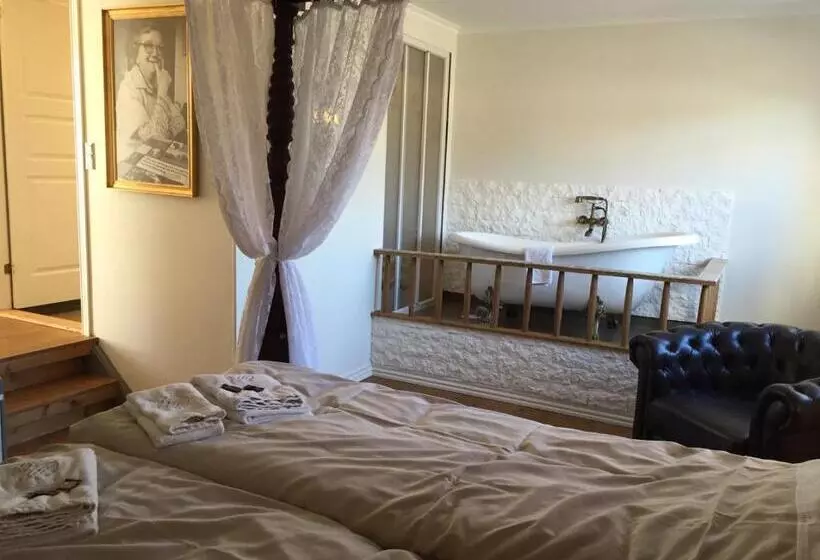 デラックスの４人部屋, Boutique Hotel Postgården