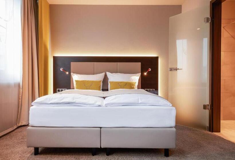 Номер Deluxe, Platzhirsch