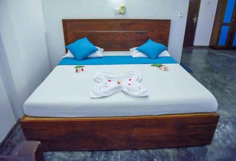 חדר סטנדרט לשלושה עם נוף לגינה, Vibration