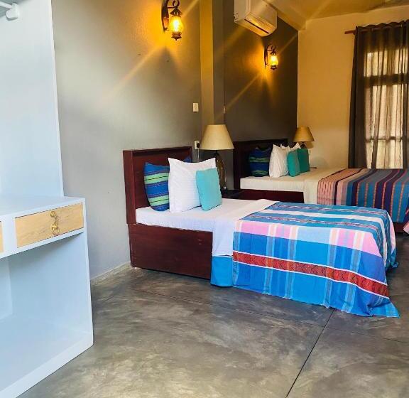 חדר סטנדרט לשלושה עם נוף לגינה, Vibration