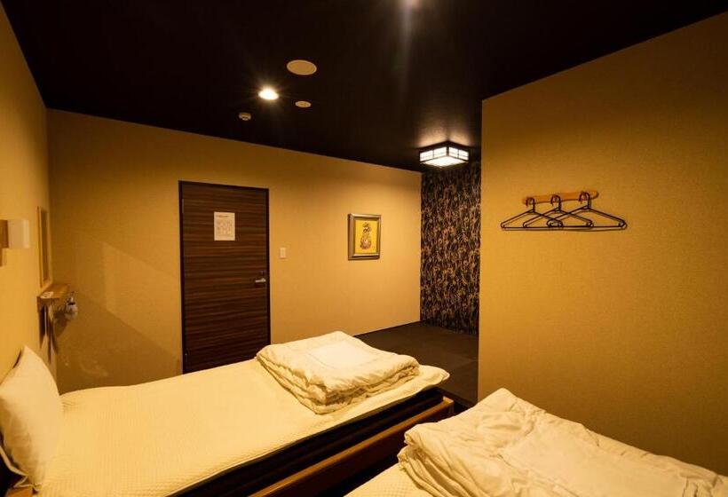 バスルーム共有のトリプルスタンダード, Guest House Ouka