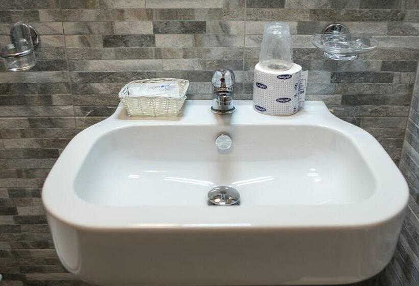 Номер Стандарт, Scigliano