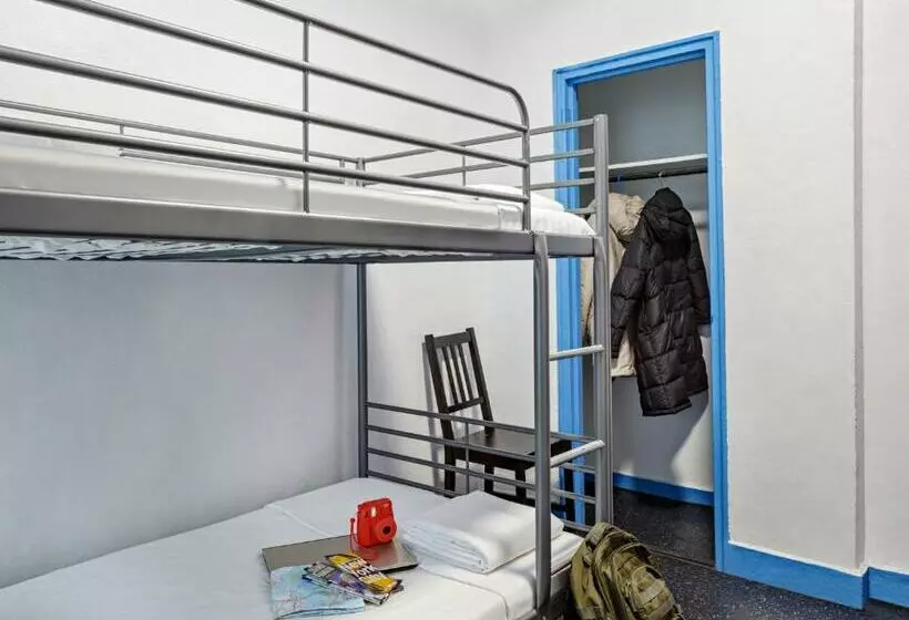 Bed in Shared Room with Shared Bathroom