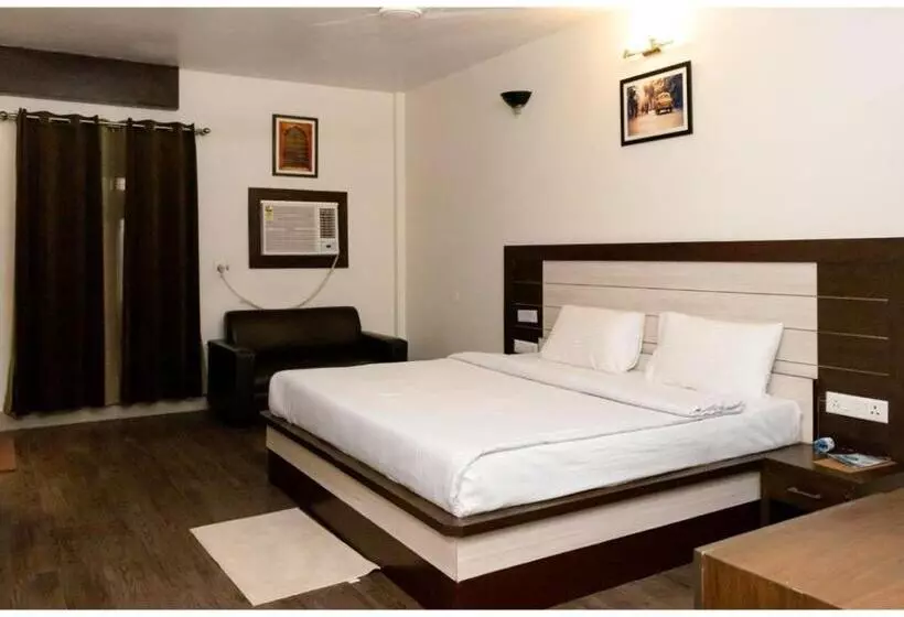キングサイズベッドのスタンダードルーム, Ritumbraha Hotel & Resort