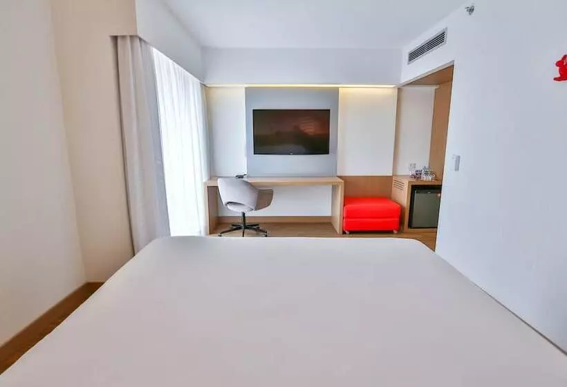 キングサイドベッドのスタンダードワンルーム, Radisson Red Campinas