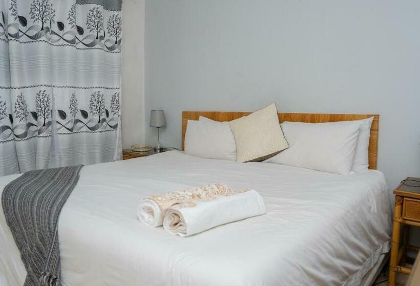 Habitación Triple Estándar Baño Compartido, Grey Shade Place