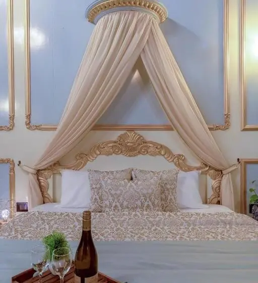 キングサイズベッドのデラックスルーム, Dio Regaalo Theme Resort, Ratnagiri