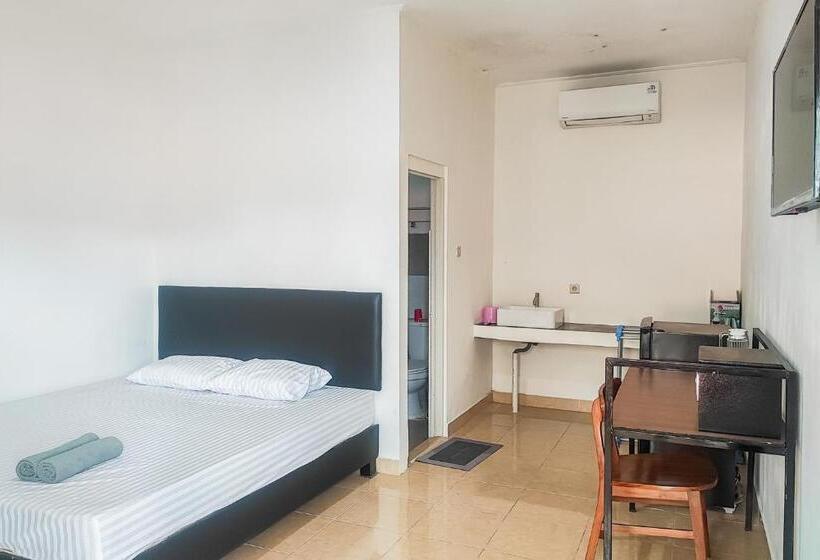 Номер Deluxe, Urbanview Ava Guest House Goa Gong