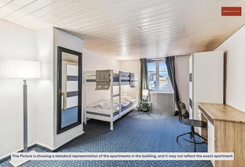 이코노미 룸, Budget Living In The Outskirts Of Zurich