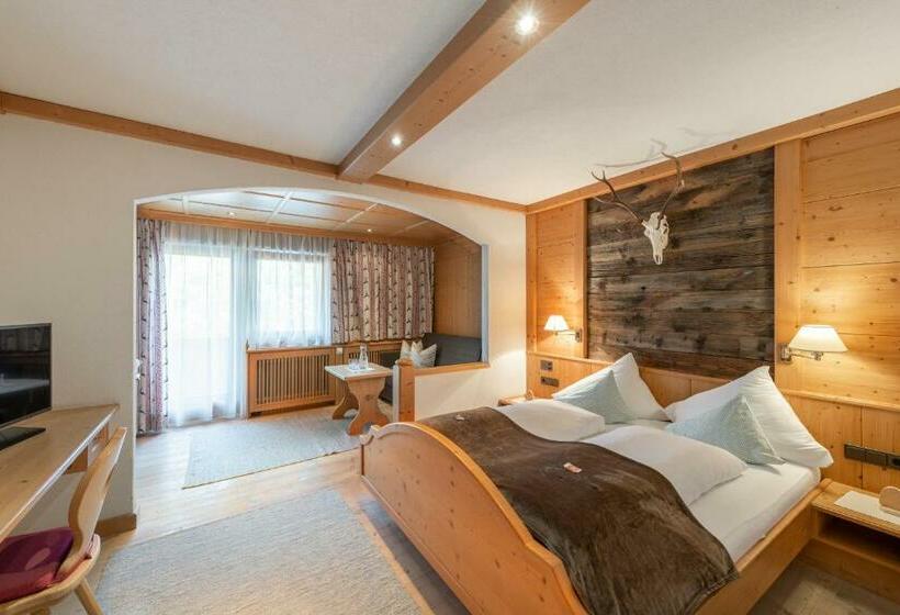 غرفة كومفورت, Alpenstolz