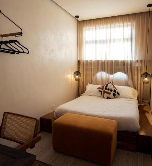 Quarto Deluxe, Casa Realm