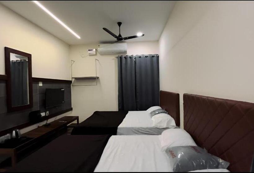 Quarto Quádruplo Estandar, Coastal Inn