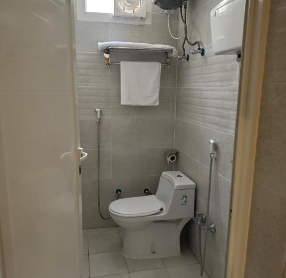 Номер Economy, فندق جارة الغيم للاجنحة الفندقية