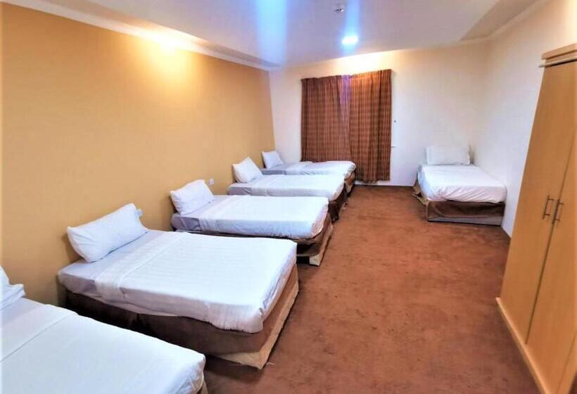 Номер Стандарт Трехместный, فندق منازل الفرقان 4