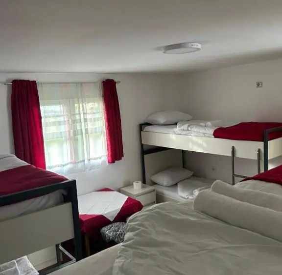 Bed in Shared Room with Shared Bathroom, Sneza