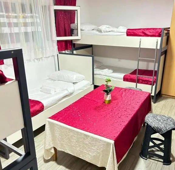 Bed in Shared Room with Shared Bathroom, Sneza