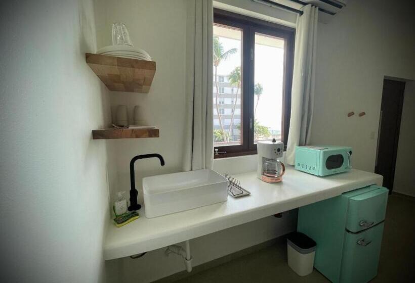 Chambre Quadruple Classique, 1 Corcega Beachfront Suites