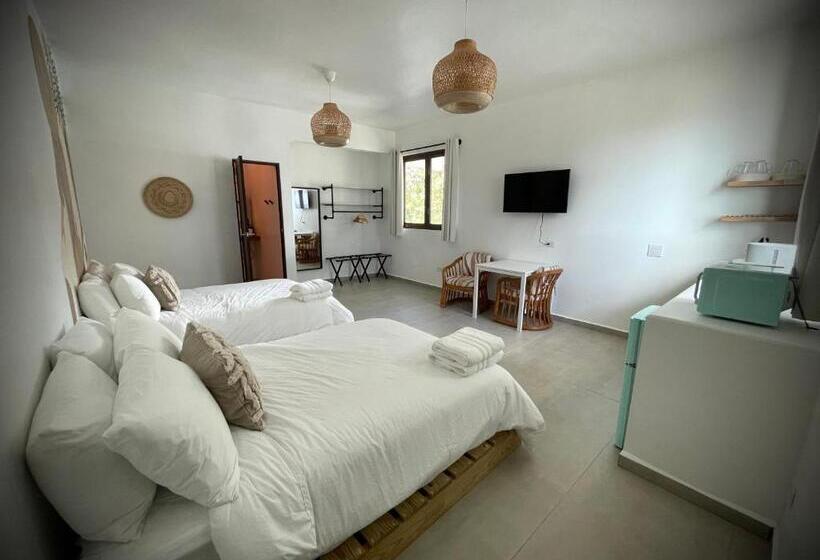 Chambre Quadruple Classique, 1 Corcega Beachfront Suites