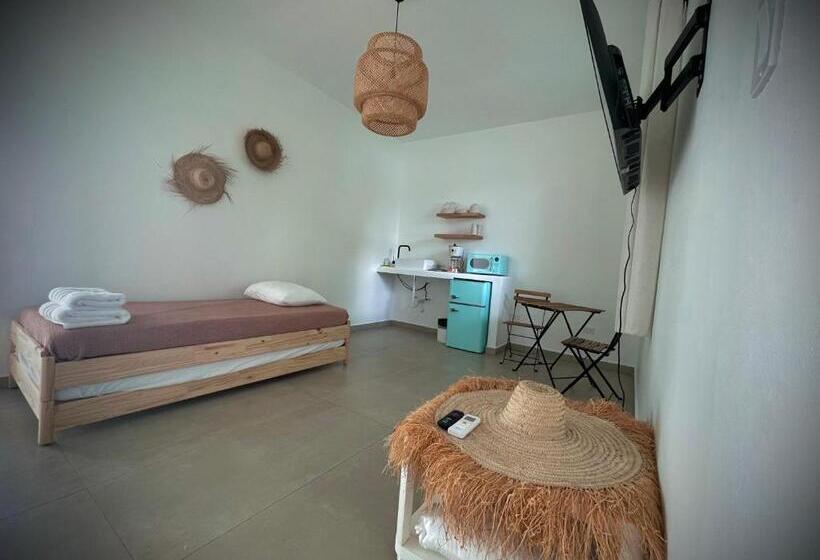 Chambre Quadruple Premium, 1 Corcega Beachfront Suites