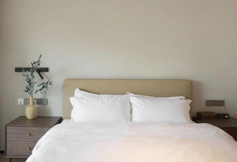 Люкс Кровать Кинг, Moya Homestay  Qingdao Laoshan Scenic Area Yangkou Store