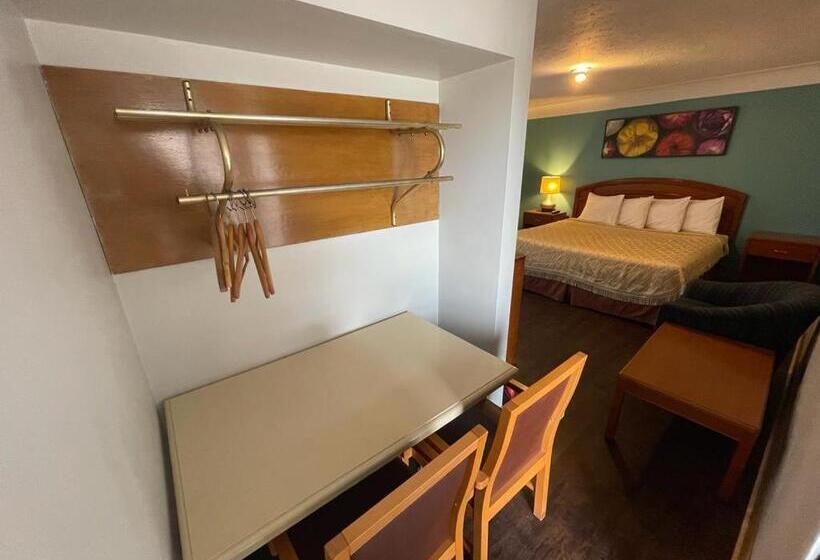 Quarto Estandar Cama King, Queen S Motel