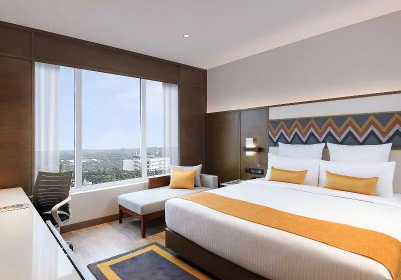 キングサイズベッドのエクゼクティブルーム, Novotel Guwahati Gs Road