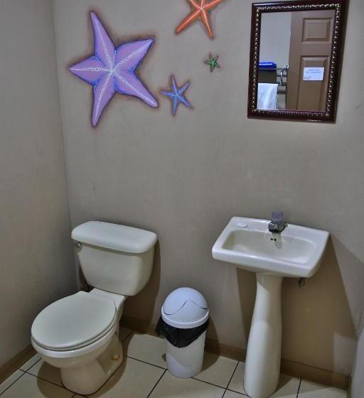 غرفة رباعية اقتصادية مع حمام مشترك, Mangifera Hostel