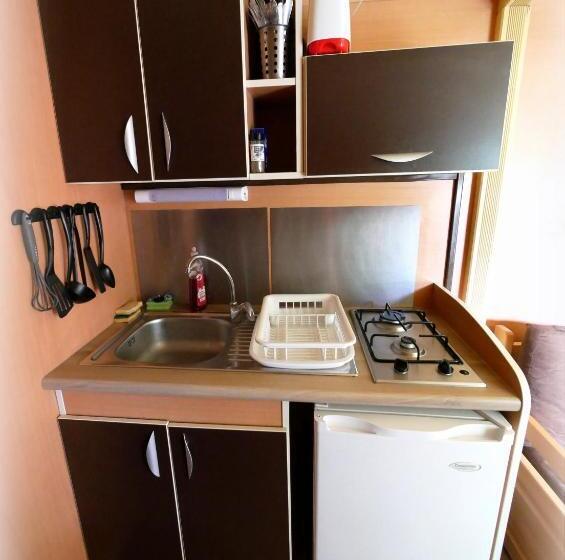 بنجلو قياسى, Auberge De La Rivière