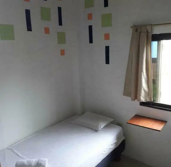 Neljän hengen Economy-huone jaetulla kylpyhuoneella, Hostal Casa Taisha