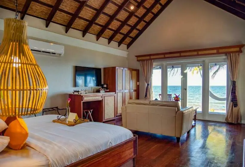キングサイズベッドのスタンダードルーム, Almond Beach Resort At Jaguar Reef