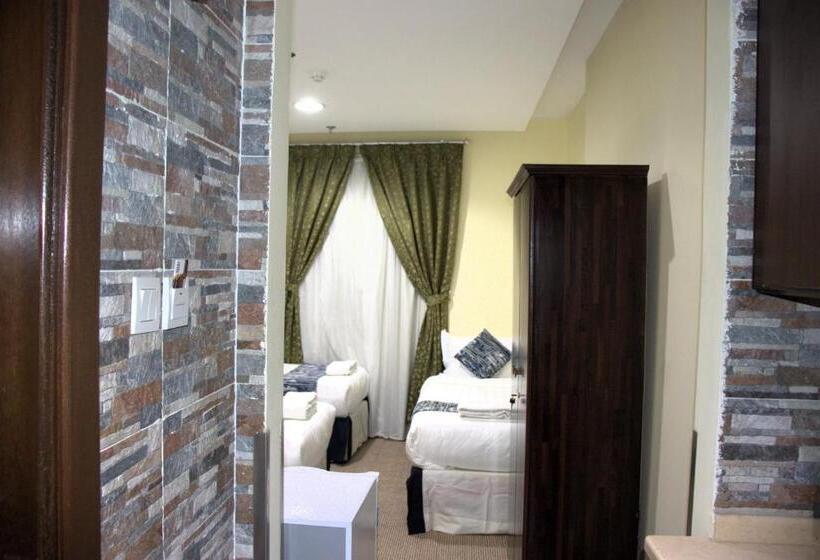 Standard Neljän Hengen Huone, Loulouat Al Anood Hotel Makkah Free Shuttle Service
