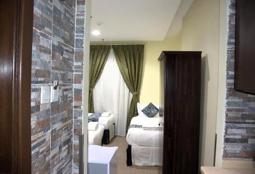 Standard Neljän Hengen Huone, Loulouat Al Anood Hotel Makkah Free Shuttle Service